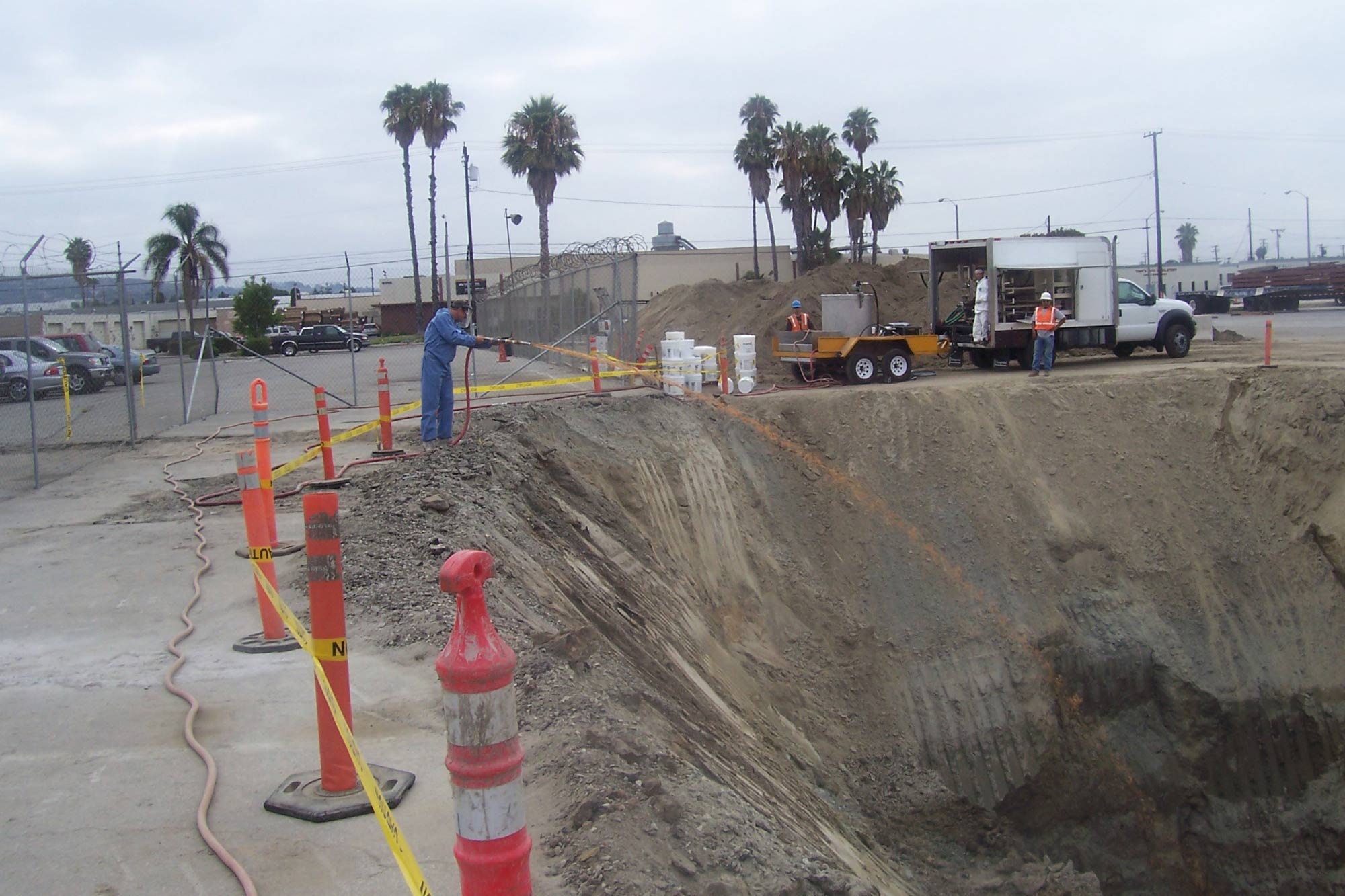 Crew performing in-situ injection of remedial compounds.