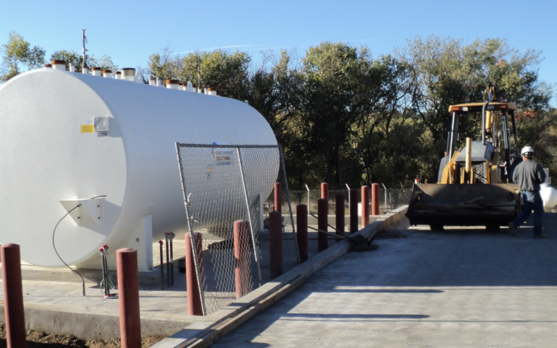 Environmental treatment equipment installed on a concrete pad.