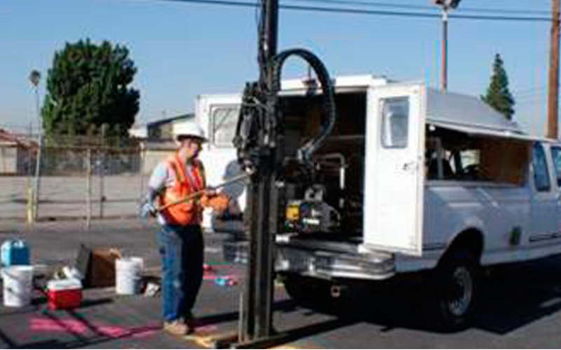 Direct-push rig advancing borings for subsurface investigation.